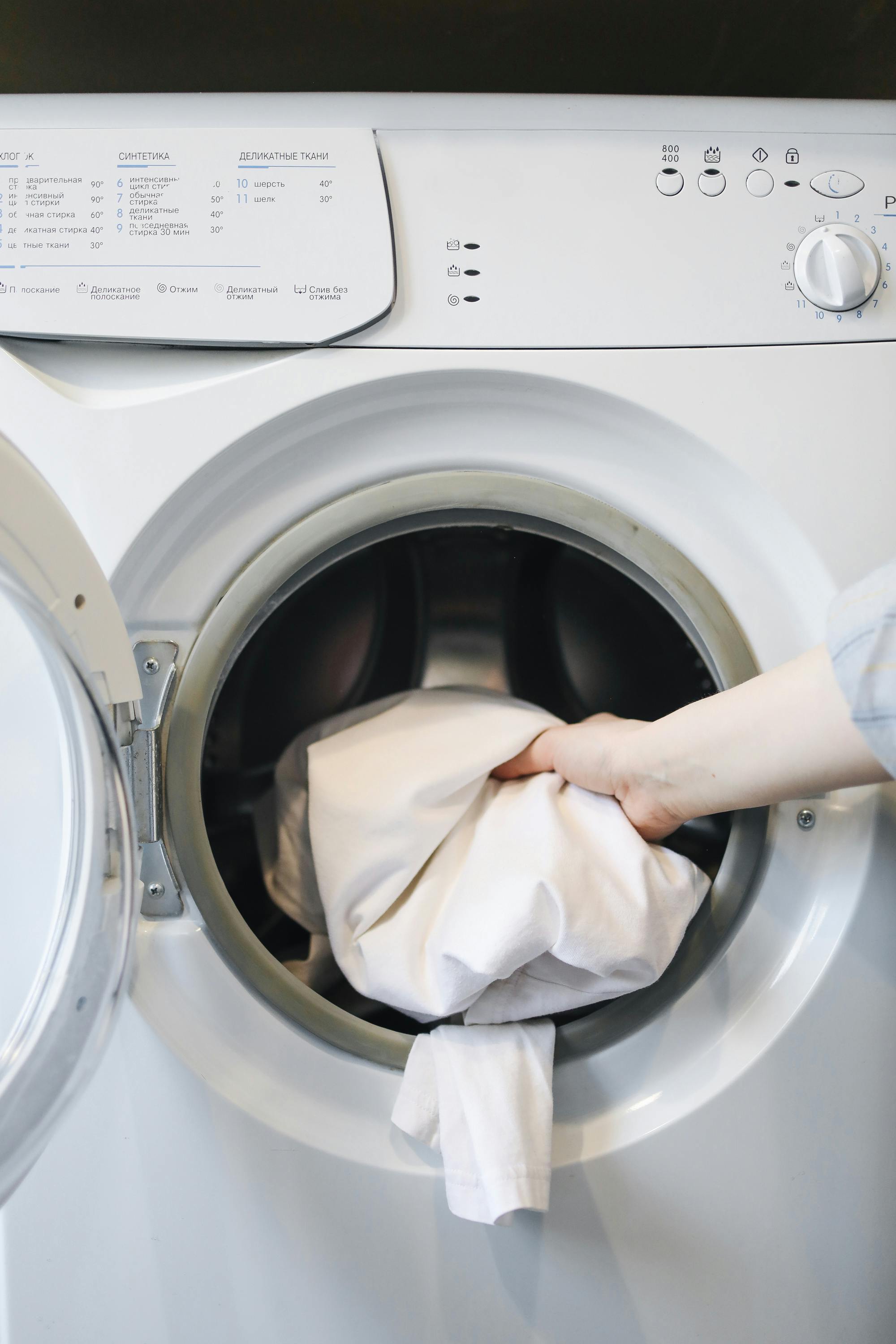 Laundry items and detergents on shelf
