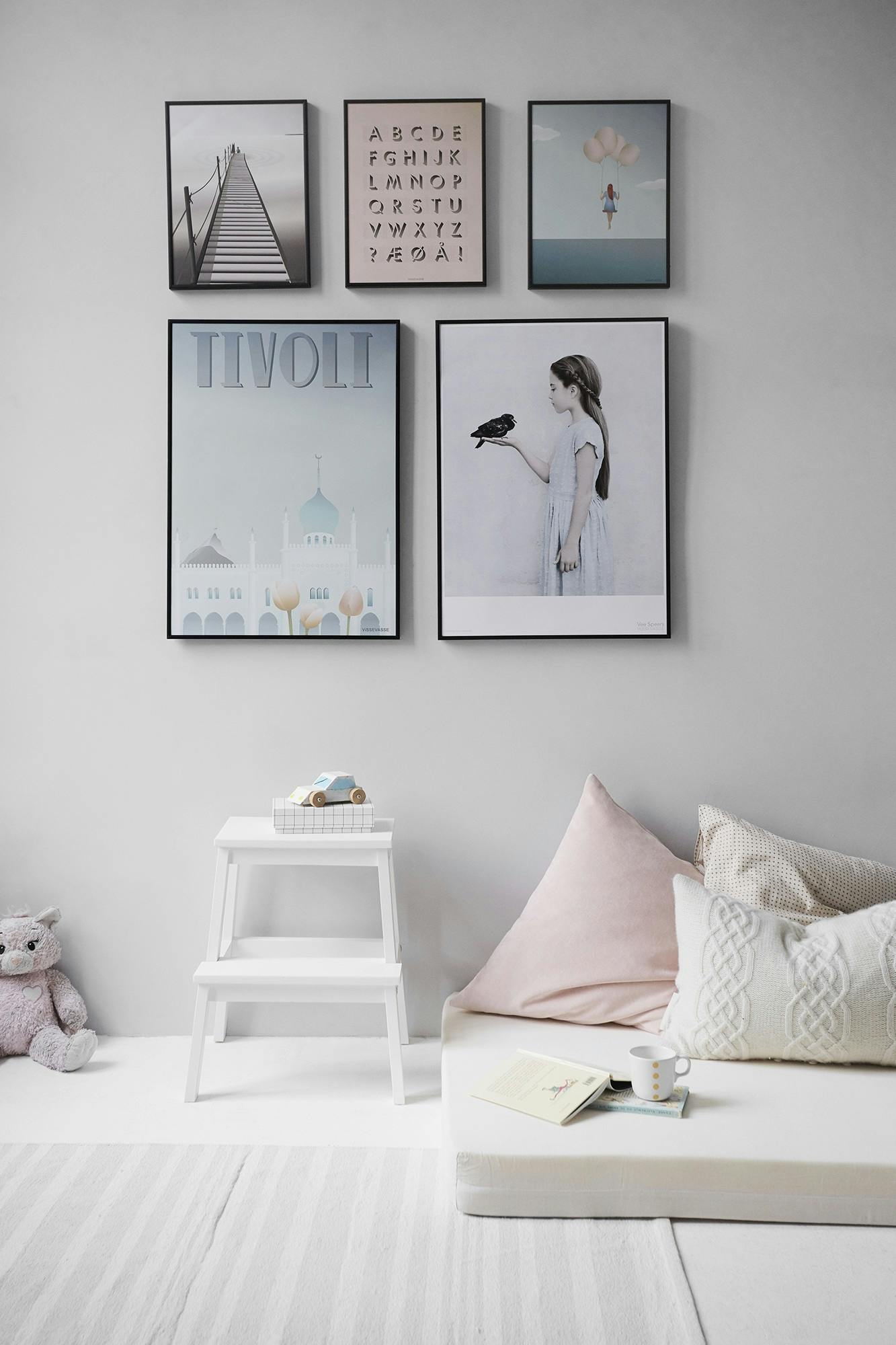 Wall art hung above sofa